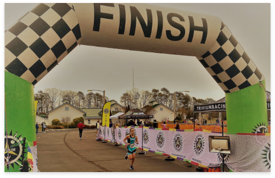 young triathlete finishing race